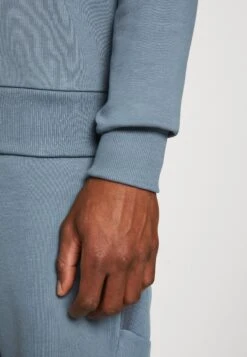 Calvin Klein New York Logo Hoodie - Hoodie - Grey Tar -About You Winkel 39d361c46fa34c30ab1e2288e6ca4004