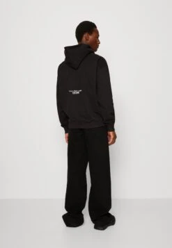 Calvin Klein Jeans Motion Floral Graphic Hoodie Genderless Unisex - Hoodie - Black -About You Winkel 3f96433bd0a7470e969185a427d8101d