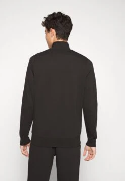 Puma Track Jacket - Sweater Met Rits - Black -About You Winkel 77c6c62bd09842ff9a7a4715107d1795