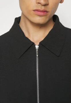 Sandro Jacket - Lichte Jas - Noir -About You Winkel d9cc1d3688e84686b446579e6491f786