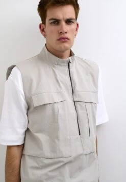 Bjoerkln- Bodywarmer - Drizzle -About You Winkel e0680a1be2ad4aaaa2ccd253c1e3c590